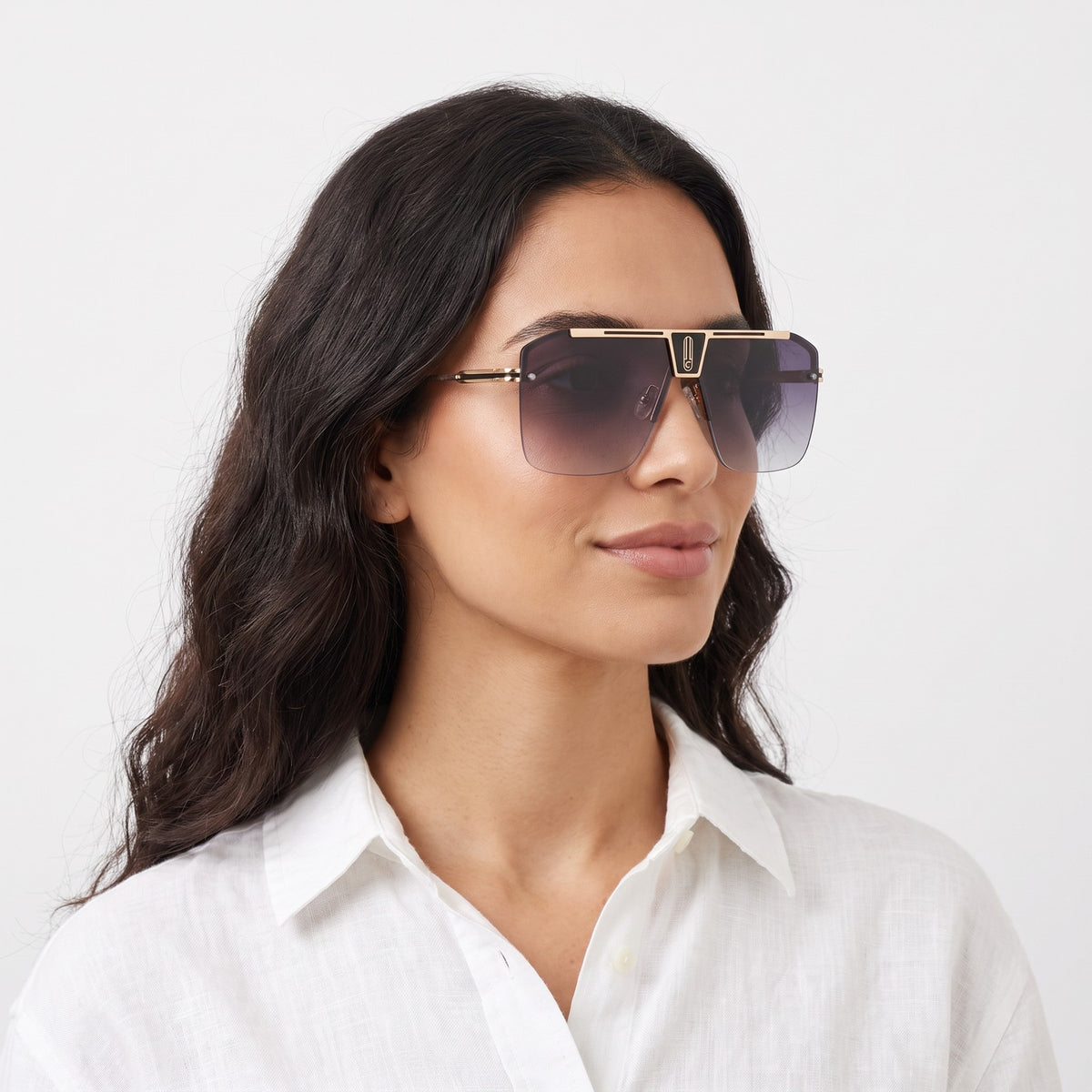 Woman in a white linen shirt wearing Alpine shield sunglasses with a grey-violet gradient lens — Velezeco #opt1_3