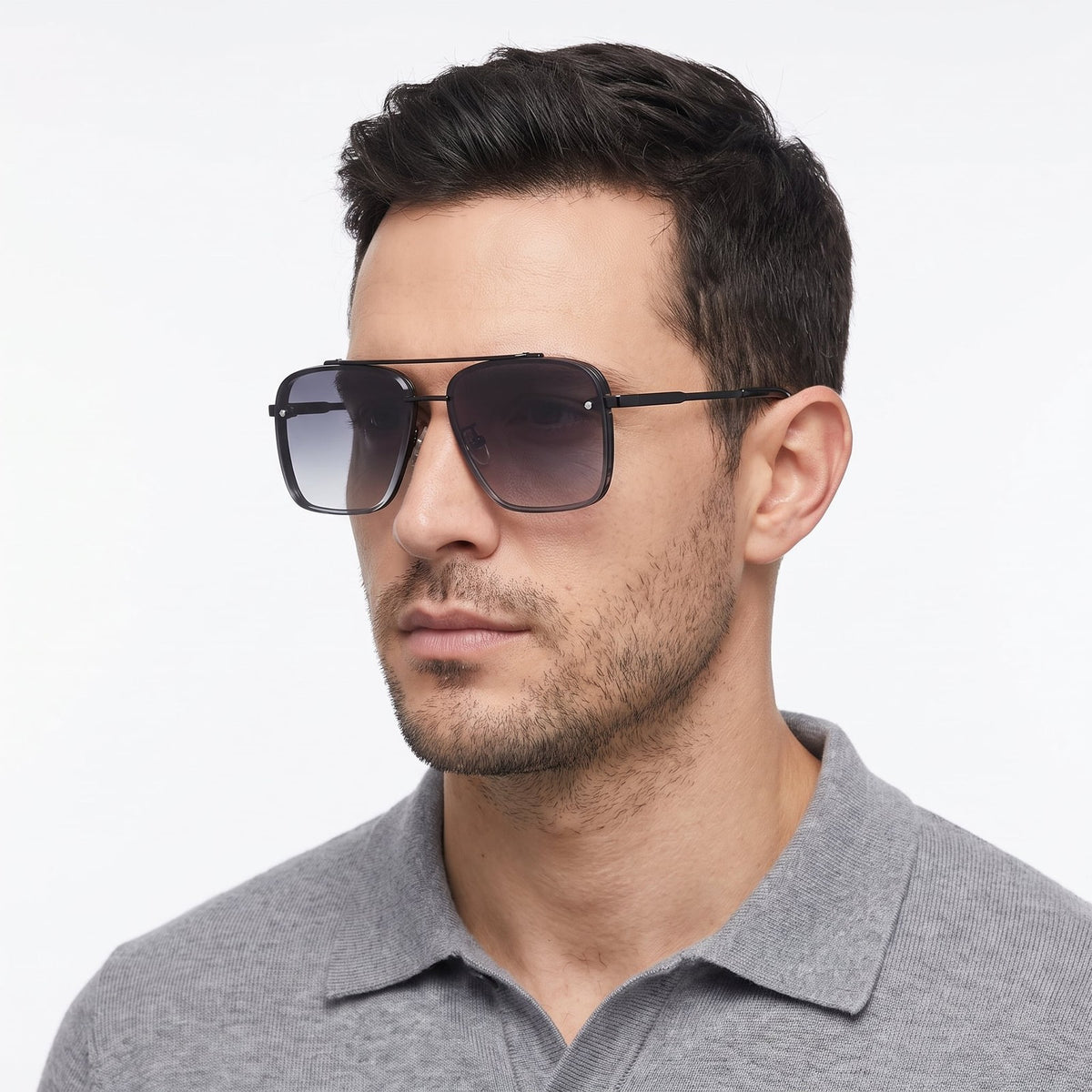 Man in a grey knit polo wearing Nordik aviator sunglasses with a black frame and grey gradient lens — Velezeco #opt1_2