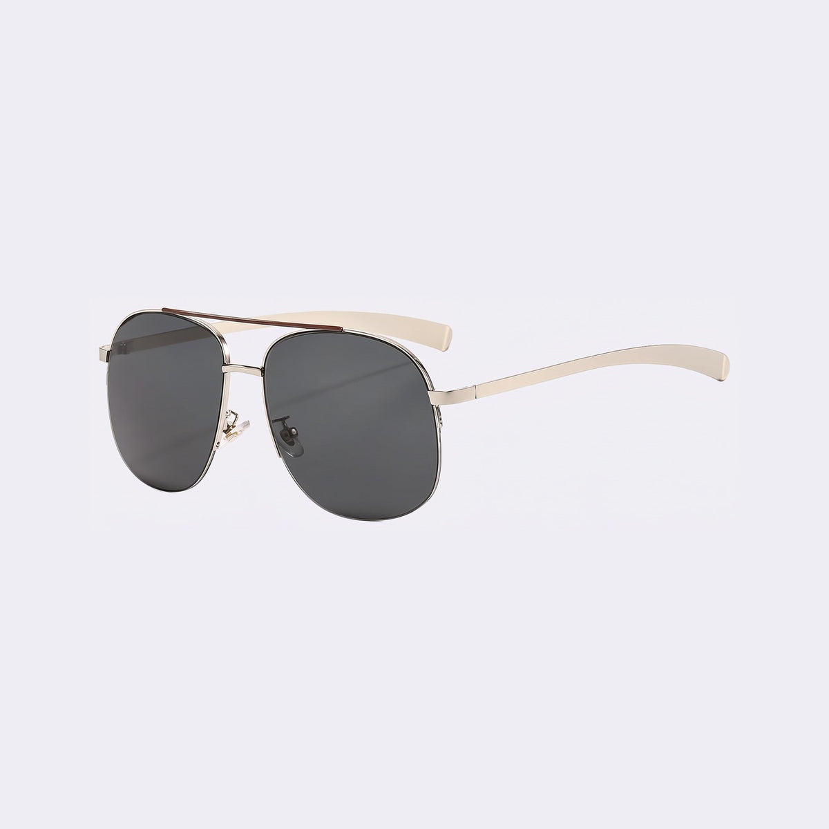 Three-quarter view of the Dubai aviator with silver double bridge and dark grey lenses and cream temples — Velezeco #opt1_1