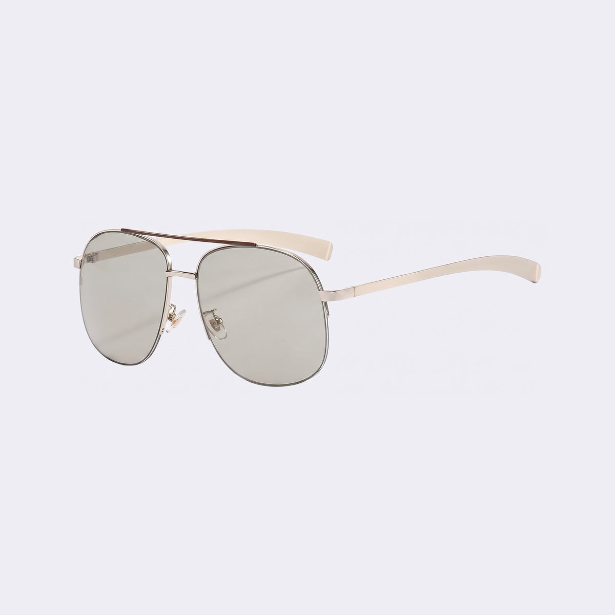Three-quarter view of the Dubai aviator with silver double bridge and light grey lenses and cream temples — Velezeco #opt1_3