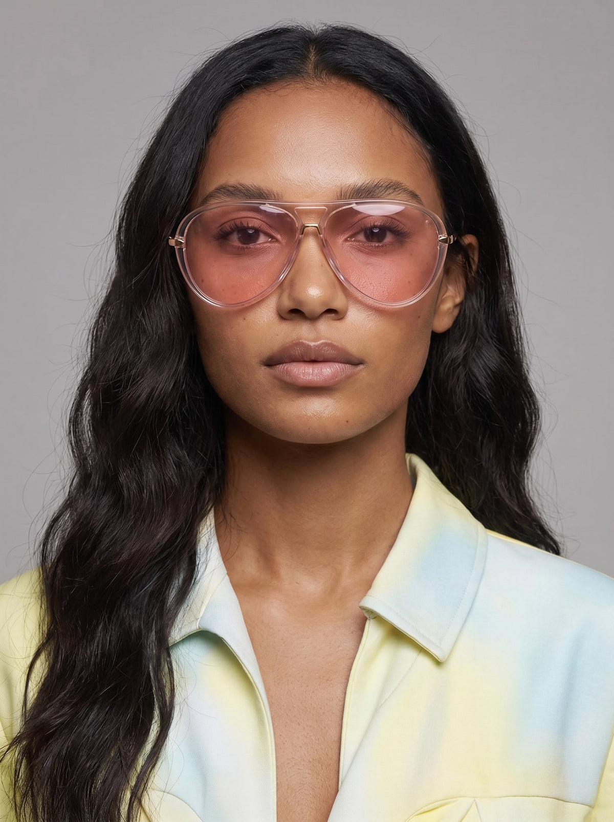 Model wearing Elysia aviator sunglasses in Pink with pink lenses — Velezeco #opt1_8
