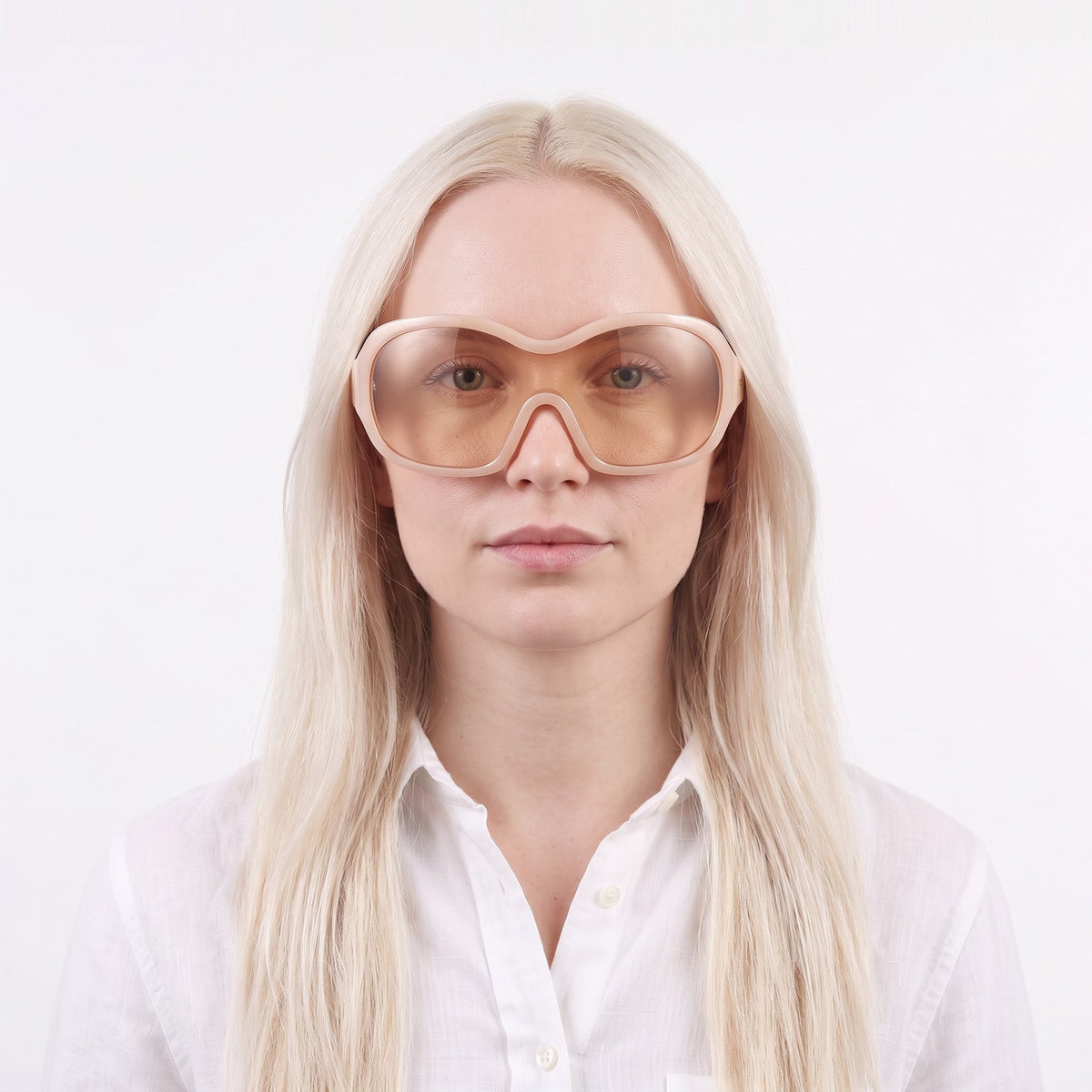 Woman in a white linen shirt wearing Marrakech shield sunglasses with champagne beige frame and peach lens — Velezeco #opt1_3