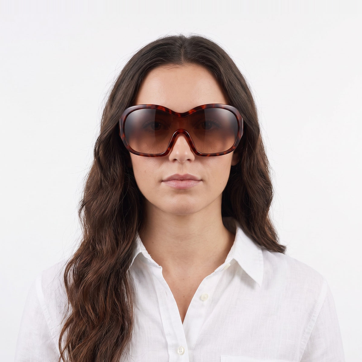 Woman in a white linen shirt wearing Marrakech shield sunglasses with tortoiseshell frame and gradient brown lens — Velezeco #opt1_1