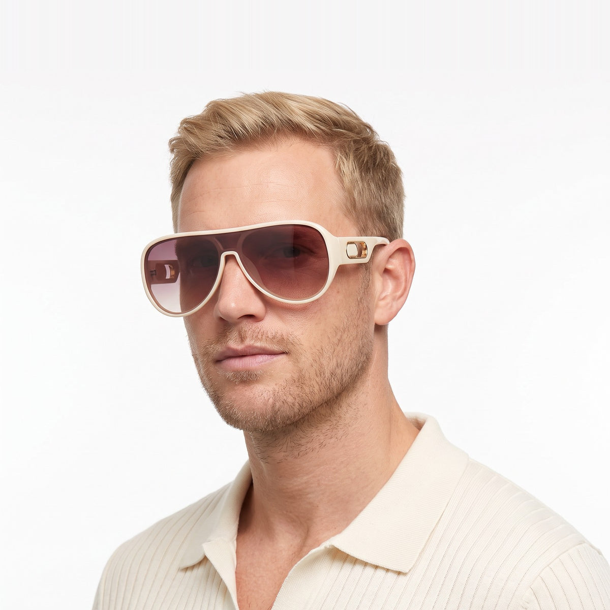 Man in a cream knit polo wearing Portofino shield sunglasses with cream frame and purple gradient lens — Velezeco #opt1_3