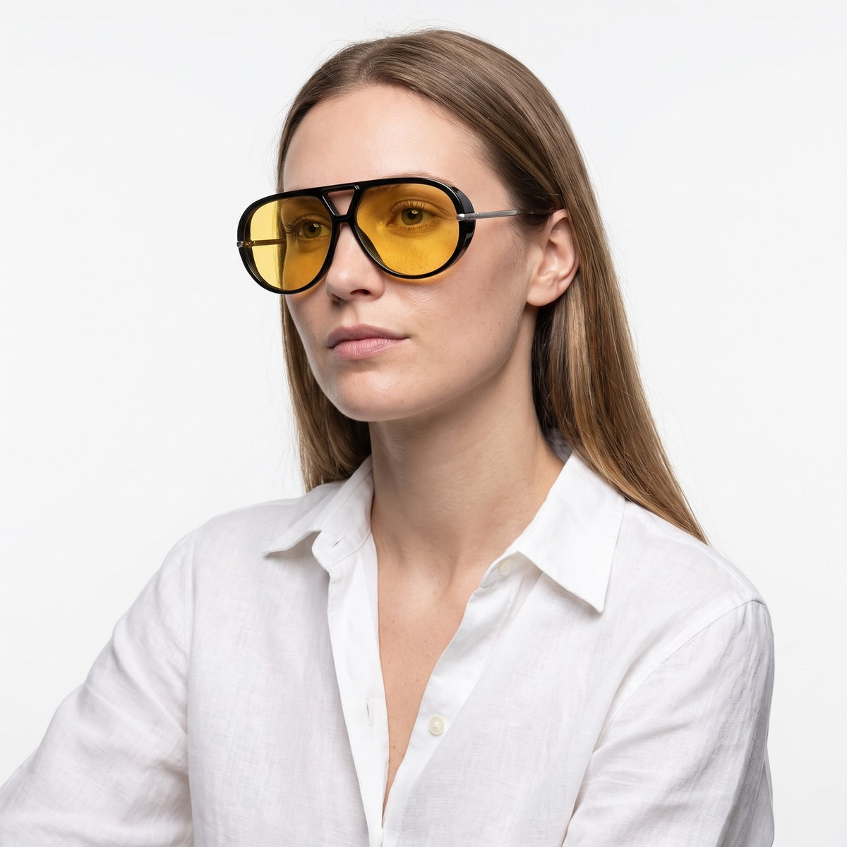 Woman in a white linen shirt wearing The Aether black aviator sunglasses with yellow lenses · Velezeco #opt1_1