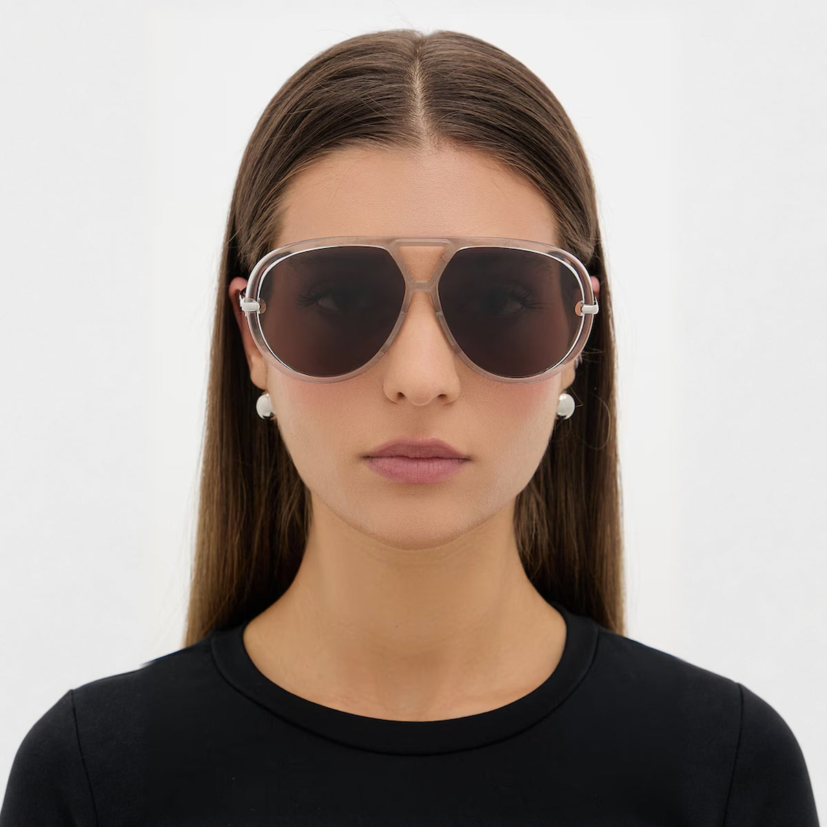 Close-up of a model wearing The Nimbus white oversized aviator sunglasses with gold temples — Velezeco #opt1_6