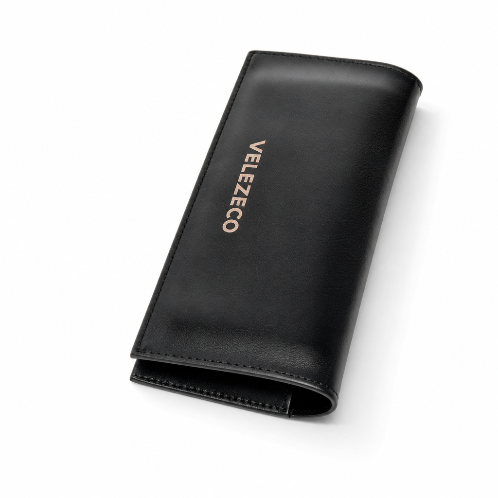 Velezeco black leather sunglasses case with fold-over flap and stitching, angled view