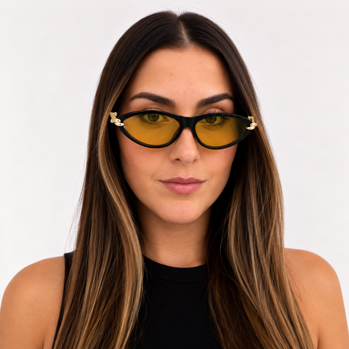 Woman wearing VELEZECO Santorini black cat-eye sunglasses with yellow lenses and gold details — Yellow#opt1_3
