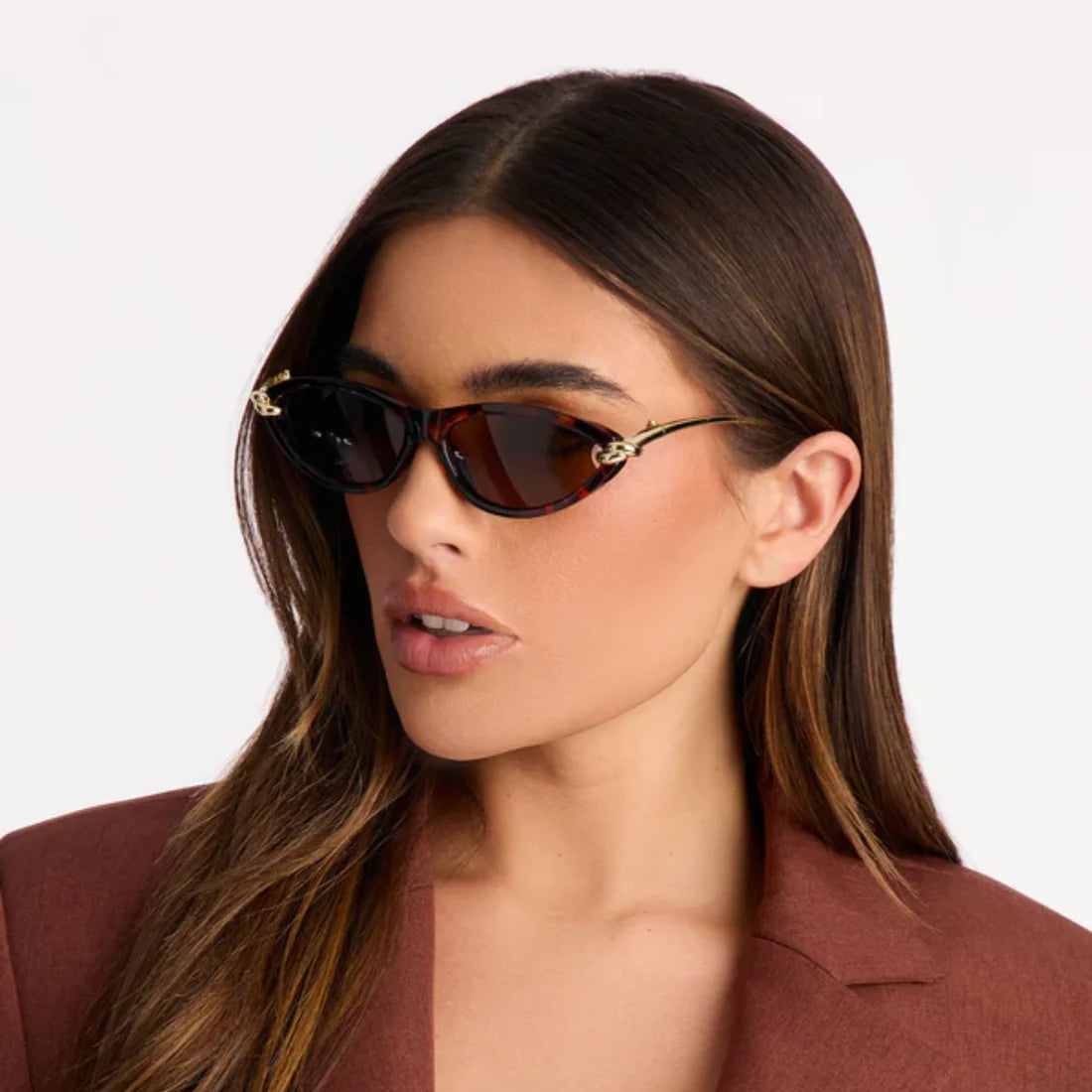 Front view of woman wearing VELEZECO Santorini tortoiseshell cat-eye sunglasses with brown lenses — Tortoiseshell / Havana#opt1_1