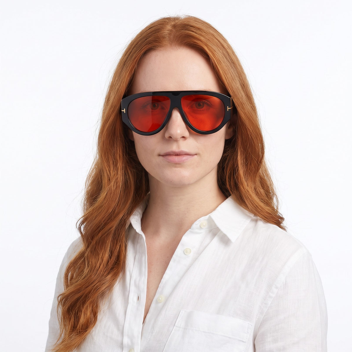 Woman in a white linen shirt wearing VELEZECO Veneza black oversized aviator sunglasses with red lenses · Red #opt1_4