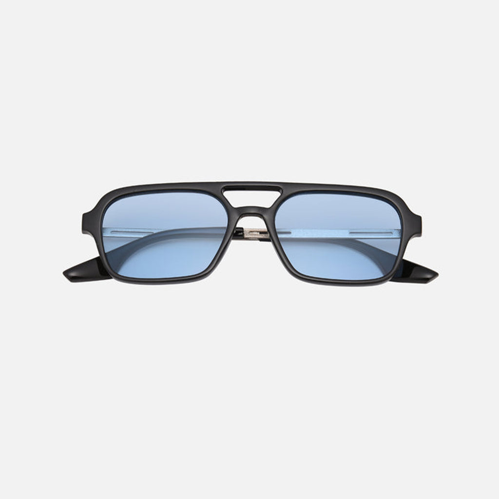 Aviator sunglasses lens close-up detail — Fuego — Velezeco