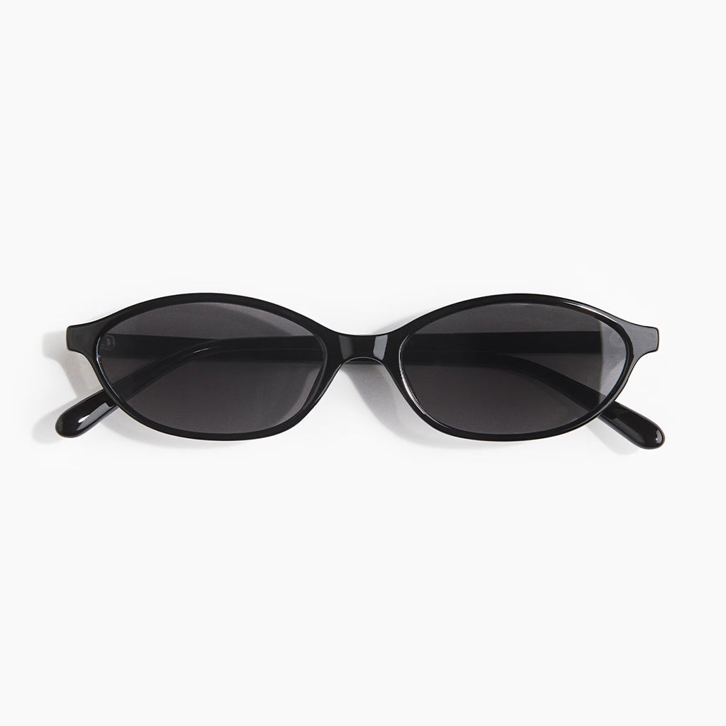 Round sunglasses angled three-quarter view — Malibu — Velezeco
