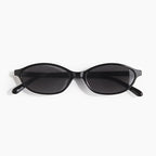 Round sunglasses angled three-quarter view — Malibu — Velezeco