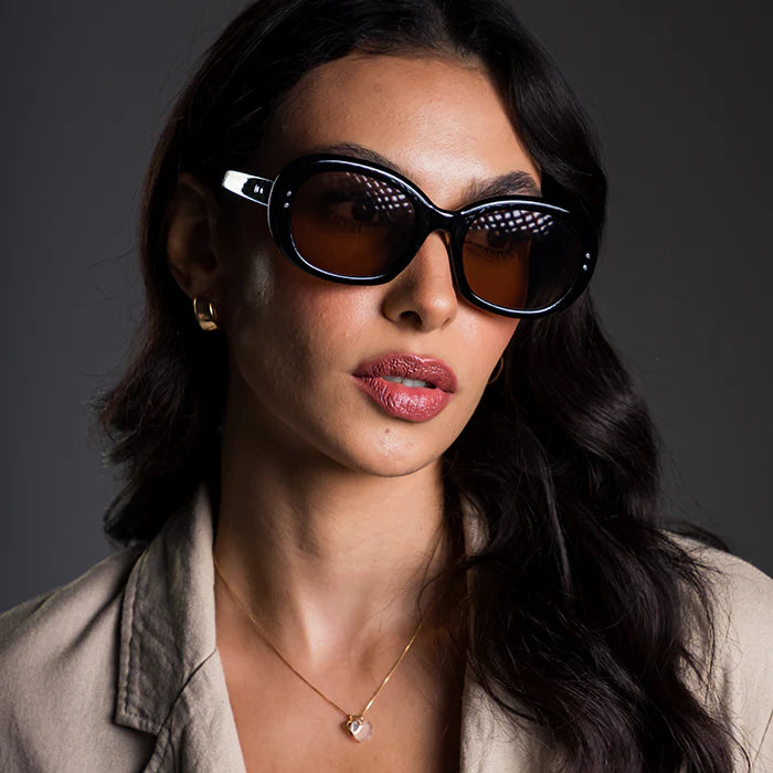 Aviator sunglasses worn by model outdoors — Florence — Velezeco