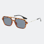 Men's sunglasses worn by model, close-up — Fasano — Velezeco