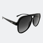 Aviator sunglasses worn by model outdoors — Bali — Velezeco