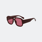 Oversized sunglasses angled three-quarter view — Crimson — Velezeco
