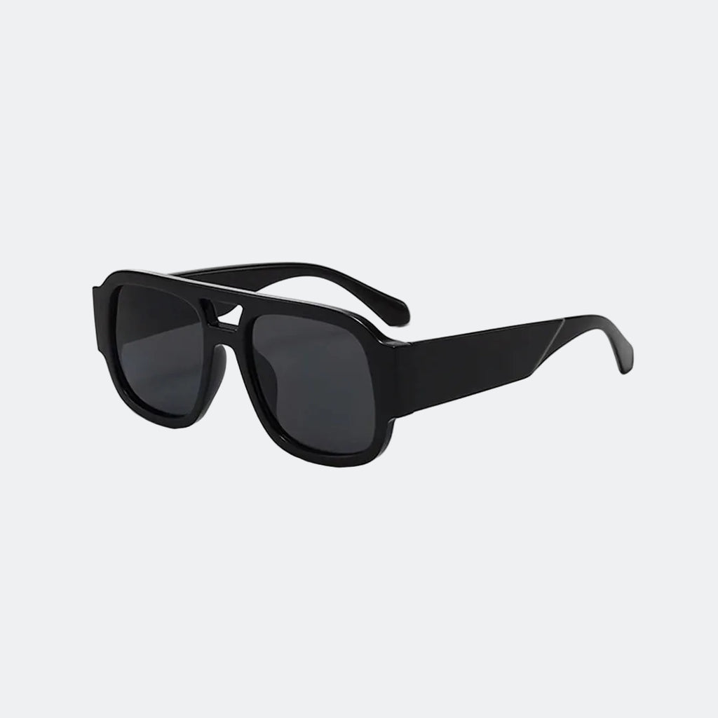 Oversized sunglasses lens close-up detail — Crimson — Velezeco
