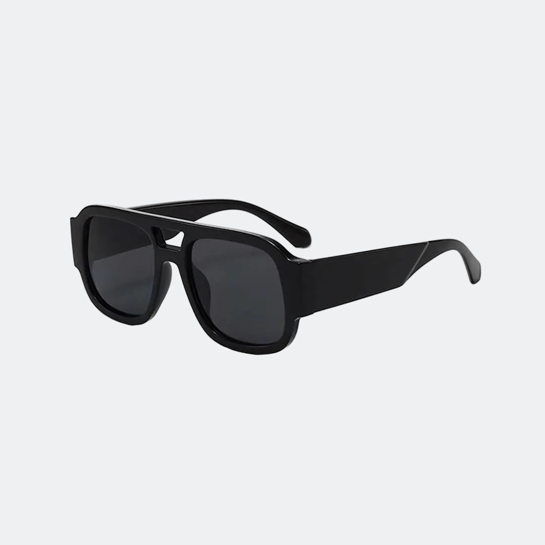 Oversized sunglasses lens close-up detail — Crimson — Velezeco