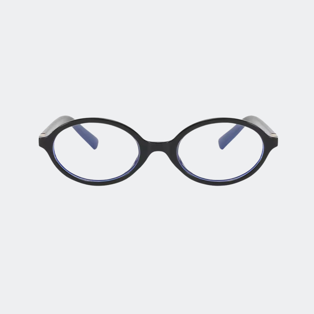 Close-up of blue-light-filtering lenses and hinge detail on the oval frame — Louiz — Velezeco