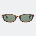 Round sunglasses worn by model outdoors — Kessie — Velezeco
