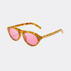 Square sunglasses worn by model outdoors — Obsidian — Velezeco