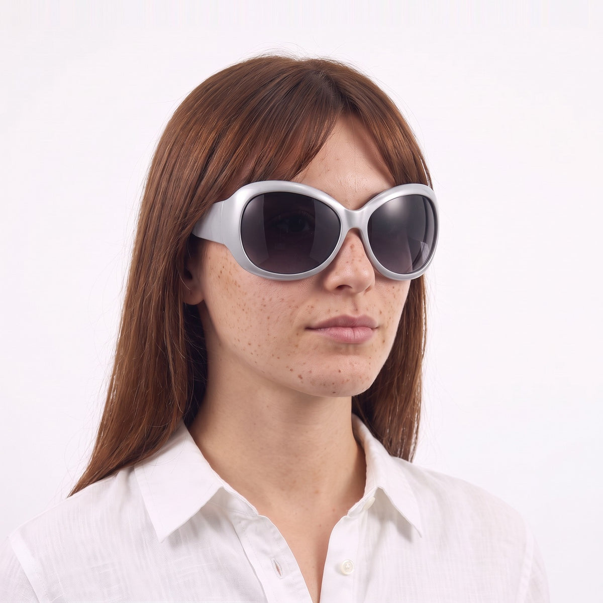 Woman in a white linen shirt wearing Barcelona bug-eye sunglasses with silver frame and gradient grey lenses — Velezeco #opt1_7
