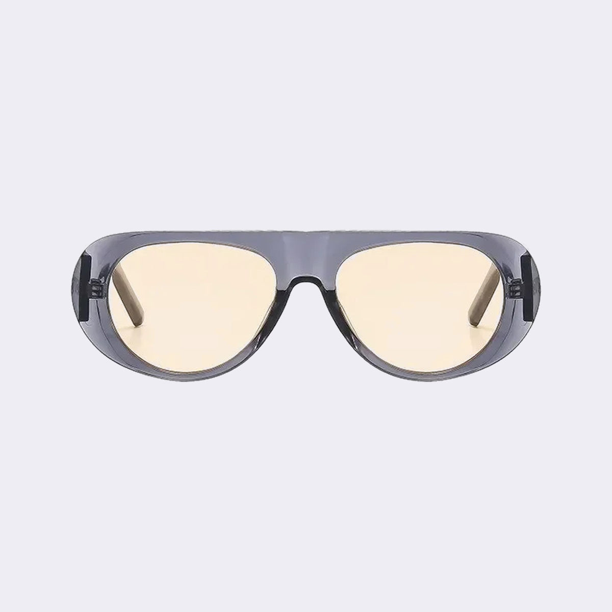 Oval goggle sunglasses with a translucent grey frame and yellow lenses, front view — Cortina — Velezeco #opt1_7