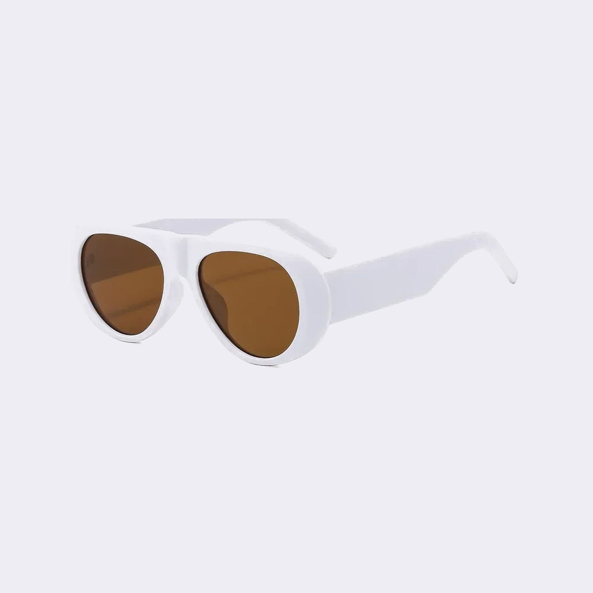 Three-quarter view of the Cortina with a white frame and brown lenses, showing the flared side shield — Velezeco #opt1_8