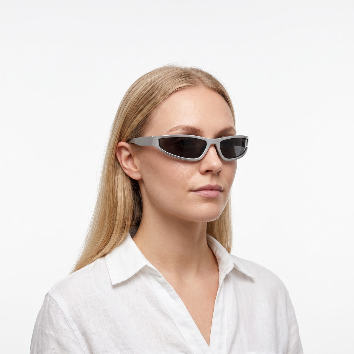 Woman in a white linen shirt wearing Dax silver-grey wraparound sunglasses with dark grey lenses · Velezeco #opt1_2