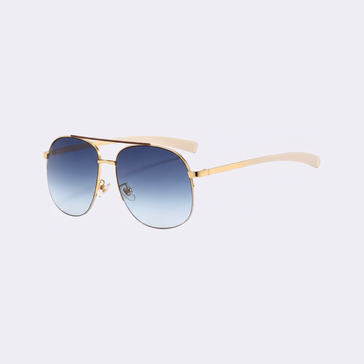 Three-quarter view of the Dubai aviator with gold double bridge and gradient blue lenses and cream temples — Velezeco #opt1_5