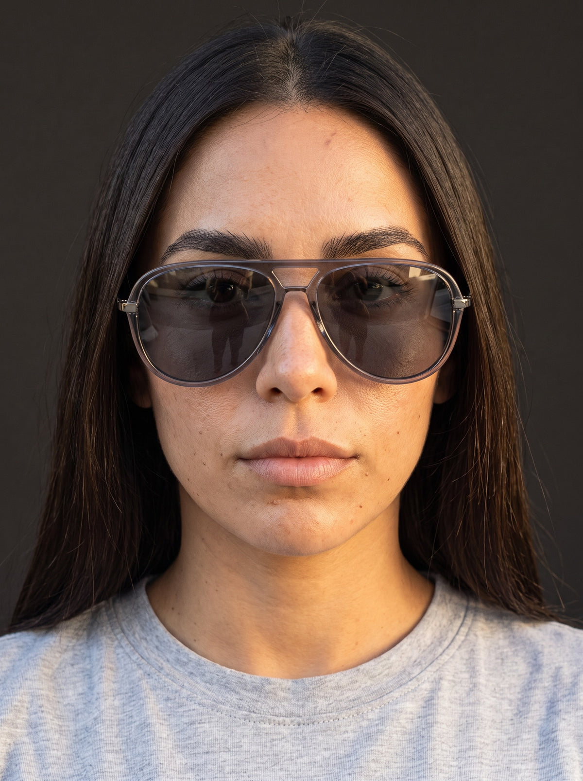 Model wearing Elysia aviator sunglasses in Grey with grey smoke lenses — Velezeco #opt1_5
