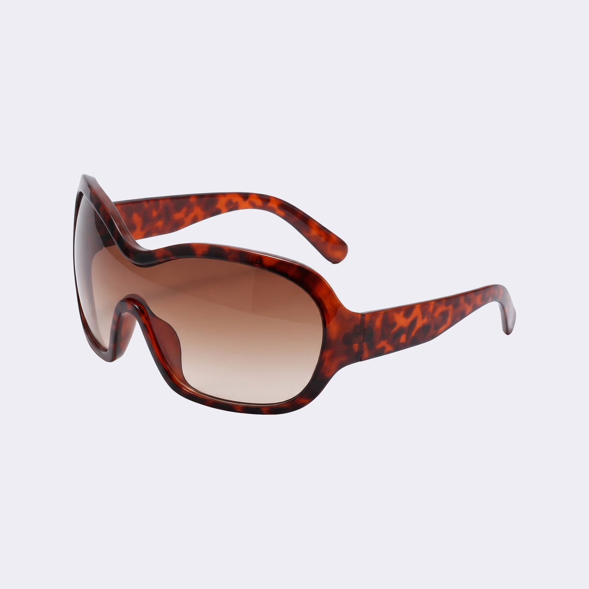 Three-quarter view of the Marrakech shield with tortoiseshell frame and gradient brown lens and wavy brow line — Velezeco #opt1_1