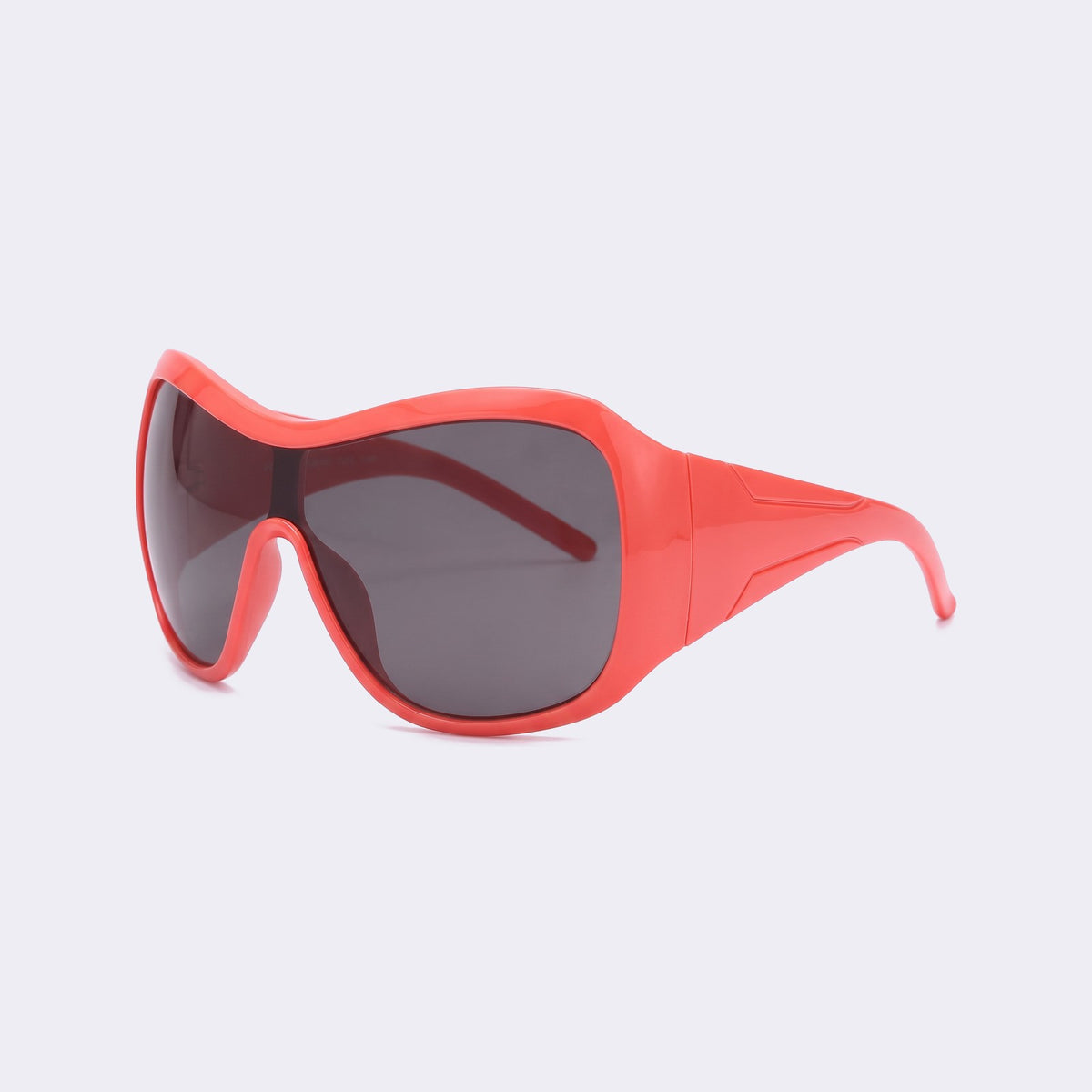 Three-quarter view of the coral red frame and grey lens showing the wide wraparound temples — Miami — Velezeco #opt1_2