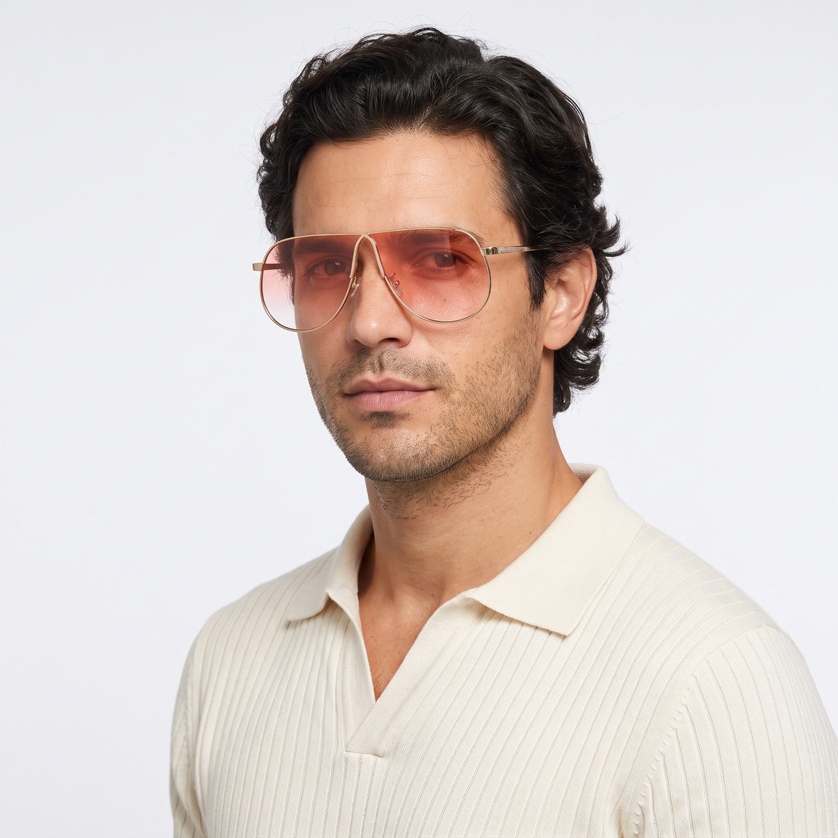 Man in a cream knit polo wearing Mirage oversized gold shield aviator sunglasses with pink gradient lenses, Pin · Velezeco #opt1_5
