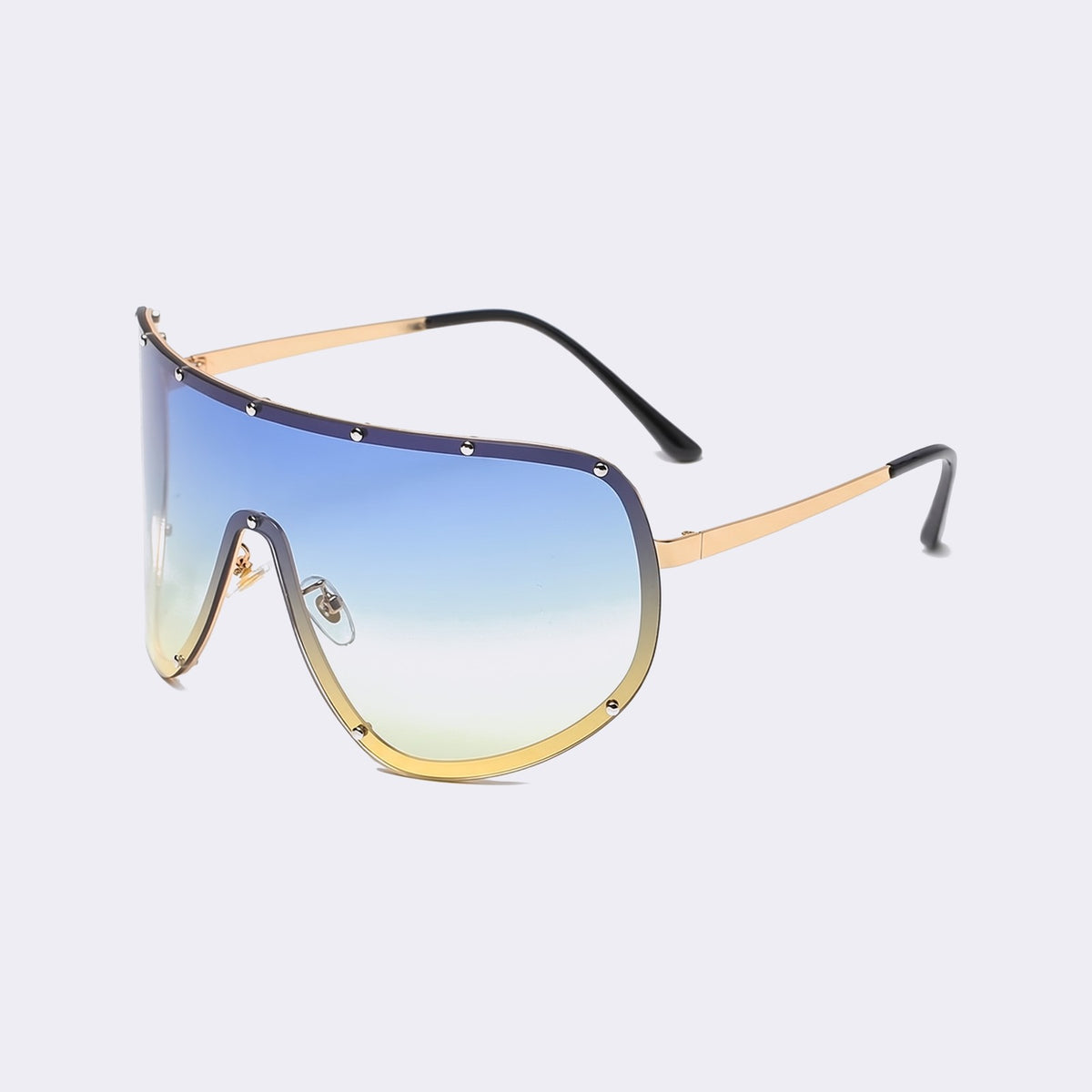 Three-quarter view of the gold studded rim and blue-to-yellow gradient lens showing the studded metal rim — Mykonos — Velezeco #opt1_7