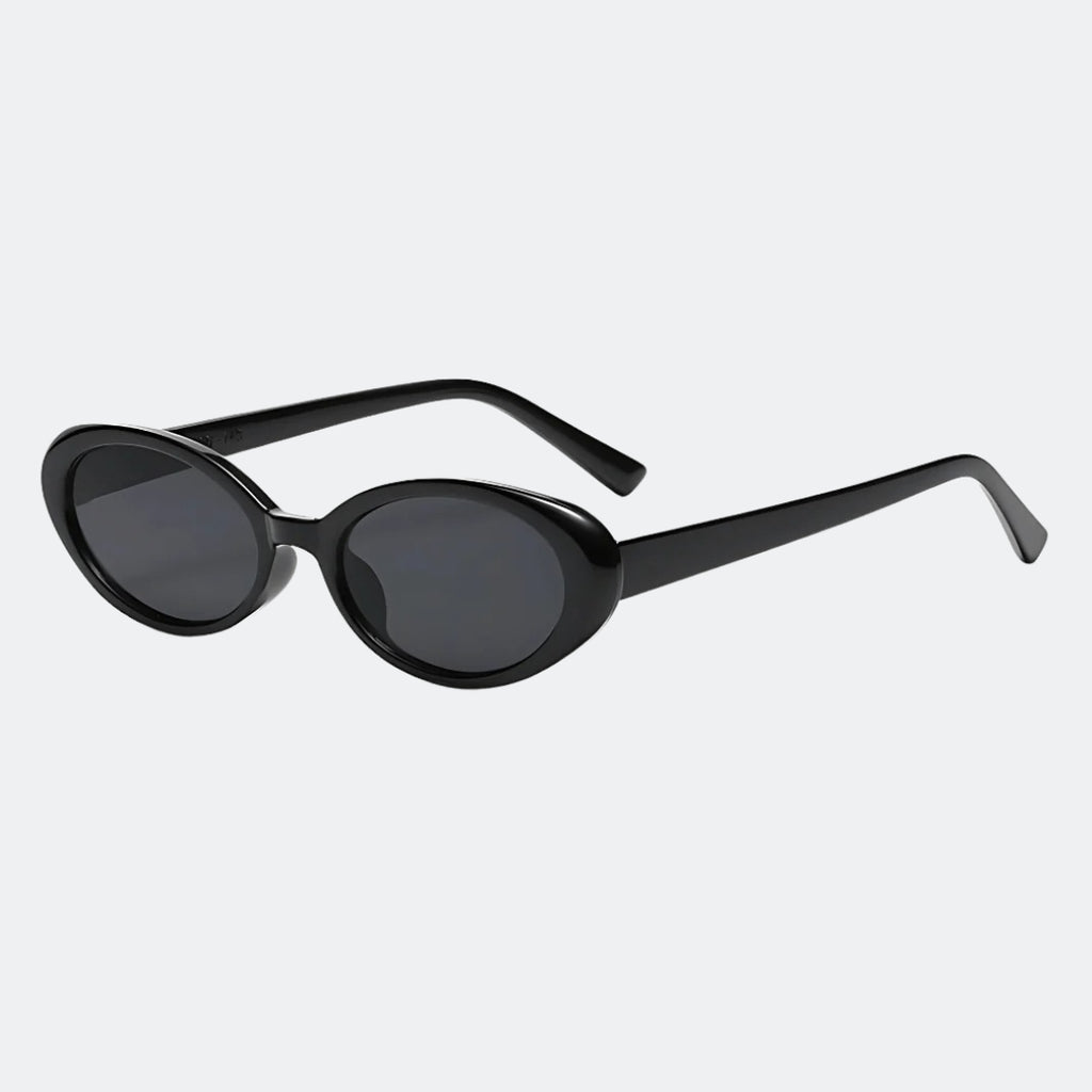 Round sunglasses lens close-up detail — Nala — Velezeco