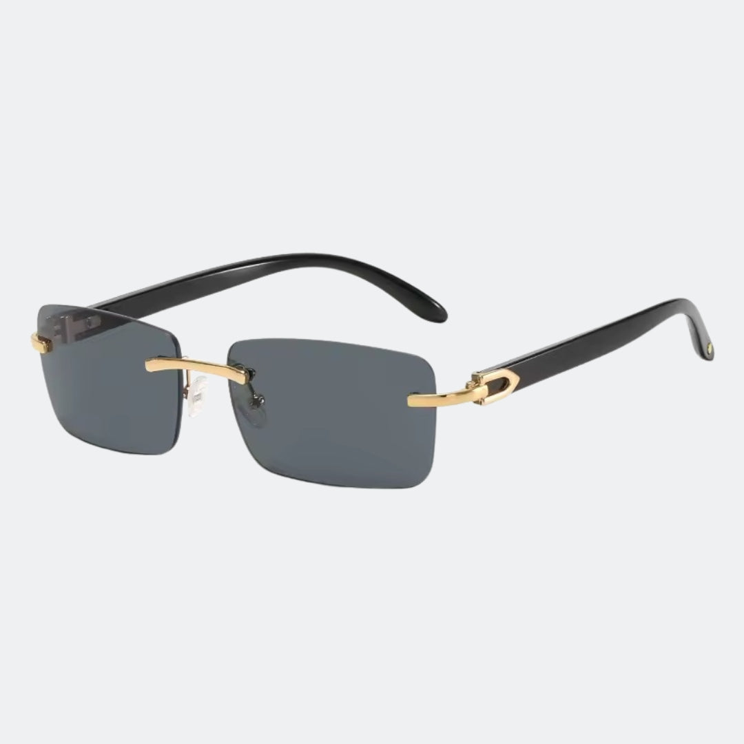 Phantom rimless sunglasses with grey gradient lenses and black temples, three-quarter view · Velezeco #opt1_1