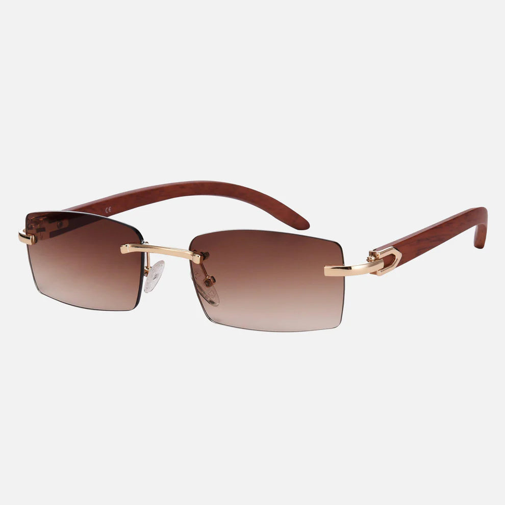 Phantom rimless sunglasses with brown gradient lenses and wood-grain temples, three-quarter view · Velezeco #opt1_2