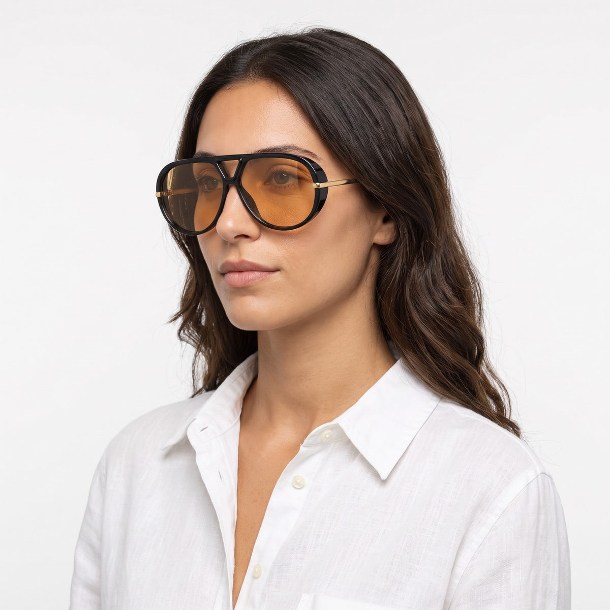 Woman in a white linen shirt wearing The Aether black aviator sunglasses with orange lenses · Velezeco #opt1_2