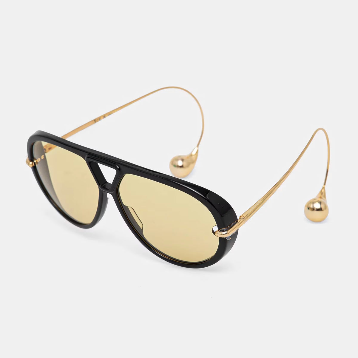 The Nimbus oversized black aviator sunglasses with yellow tinted lenses, triangle bridge and gold drop temples — Velezeco #opt1_1