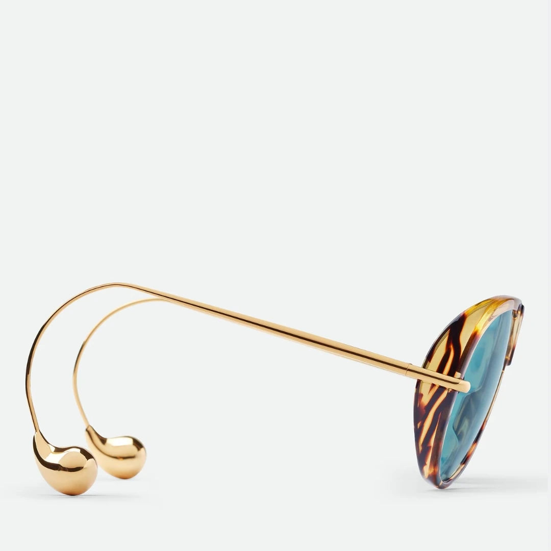 Aviator sunglasses worn by model outdoors — The Nimbus — Velezeco