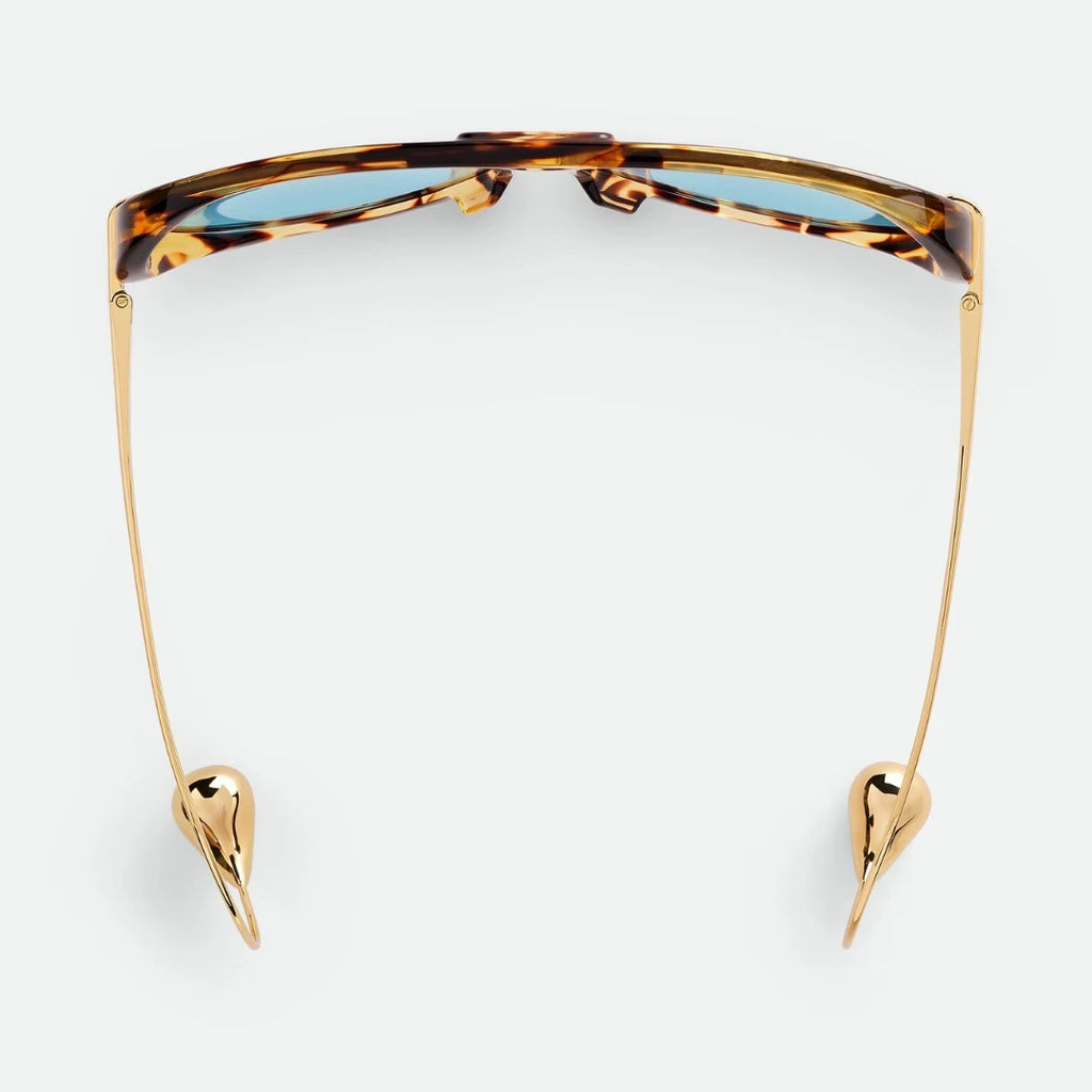 Aviator sunglasses worn by model, close-up — The Nimbus — Velezeco