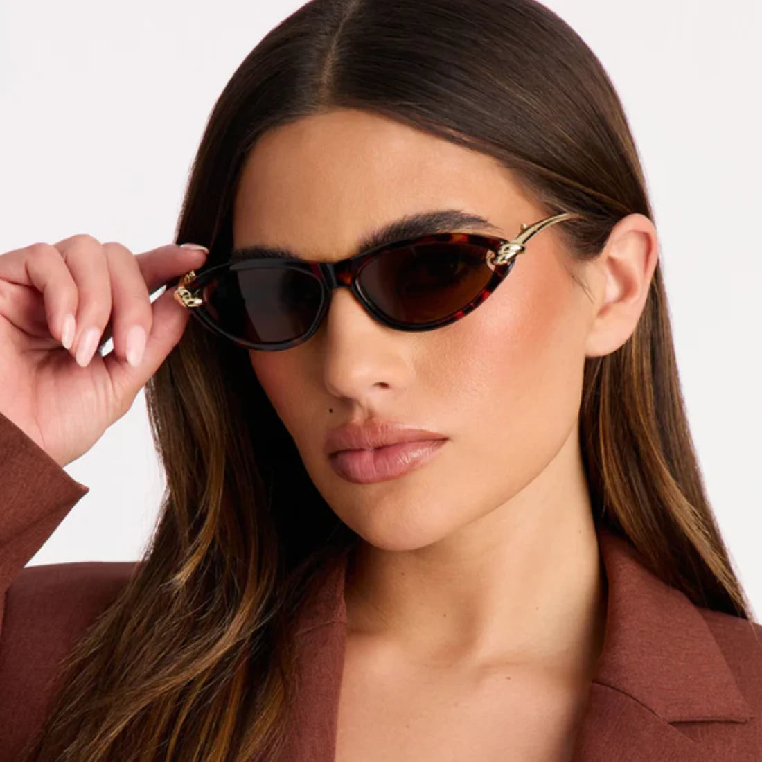 Front view of woman wearing VELEZECO Santorini tortoiseshell cat-eye sunglasses with brown lenses — Tortoiseshell / Havana#opt1_1