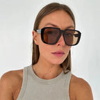 Aviator sunglasses worn by model outdoors — Verona — Velezeco