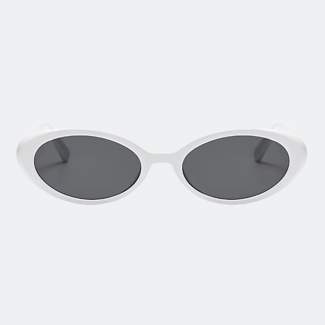 Round sunglasses worn by model outdoors — Nala — Velezeco