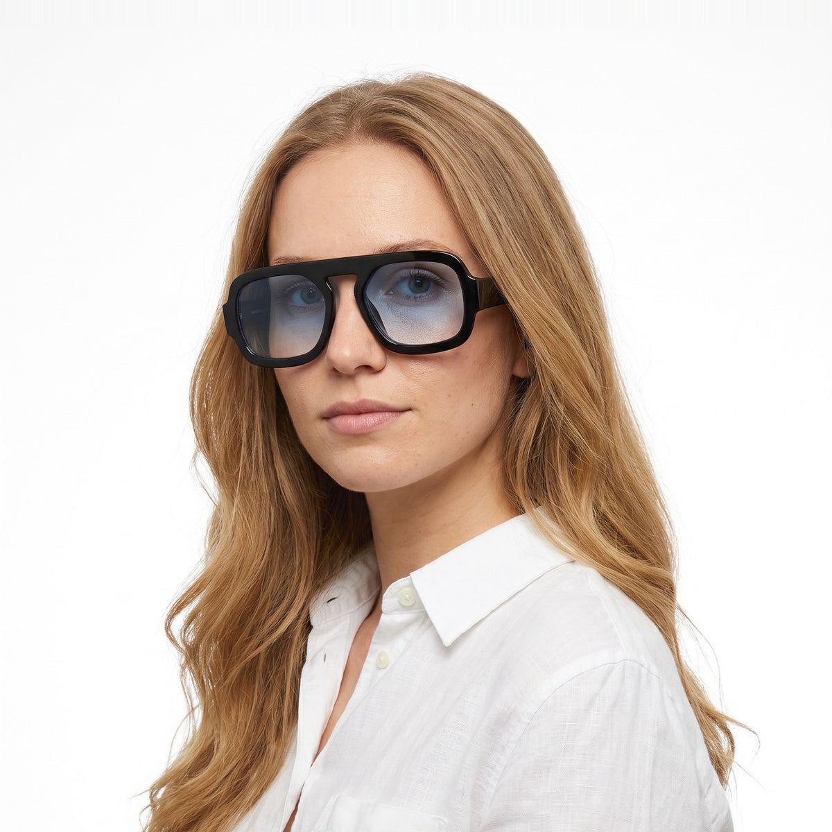 Woman in a white linen shirt wearing Vortex black square pilot sunglasses with light blue gradient lenses · Velezeco #opt1_7