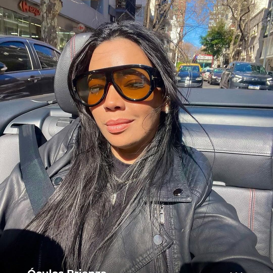 Oversized aviator sunglasses worn in the street
