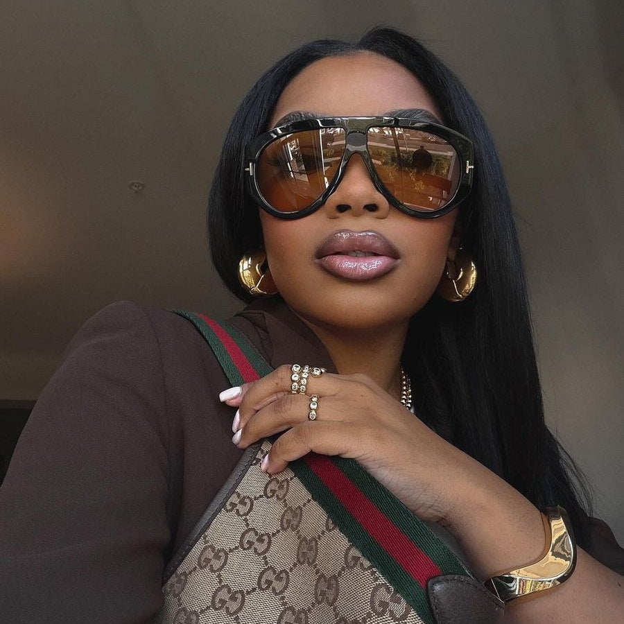 Oversized aviator sunglasses worn in the street